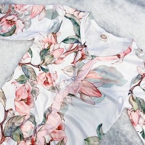 NWOT floral ruffle baby romper